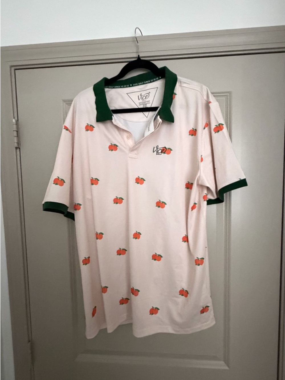 Peach-Print Polo Shirt in Cream with Green Trim